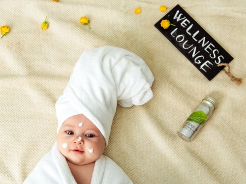 wellness_spa_text baby_lounge_bathrobe_image_sh_249891814